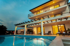 Ferienhaus in Malinska mit großem Pool